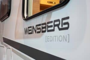 WEINSBERG X-Cursion Van (2023) – innovatives Wohnmobil auf VW T 6.1-Basis mit Schwenkbad 7 Weinsberg X-Cursion Van Logo